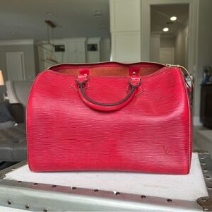 Vintage red Louis Vuitton hand bag